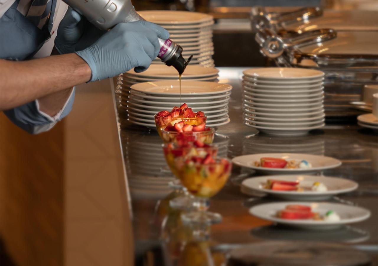 Crystal Inn Hotel - Alamein (Adults Only) El Alamein Exterior foto A pastry chef finishing a dessert